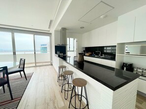 Fridge, microwave, stovetop, coffee/tea maker