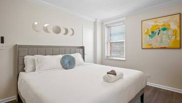 1 bedroom, desk, iron/ironing board, travel crib