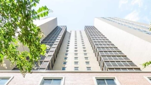 The entrance of a building with the number 300 and the name "PEACHTREE TOURS" above the entrance. - FIFA 2026 Walk to Stadium | 1BR Unit 4E ATL (Atlanta)