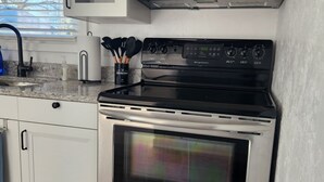 Private kitchen - 2BR Gem: Modern Comfort & Style (Cheyenne)