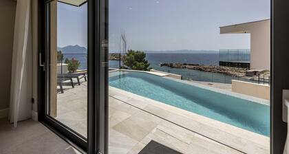 Beachfront Villa Aurelia with heated Pool, Sauna & Fitness