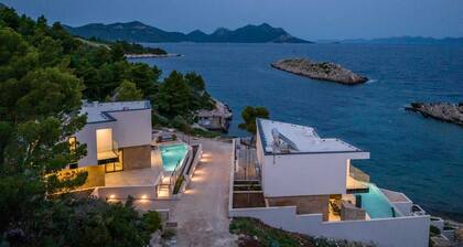 Beachfront Villa Aurelia with heated Pool, Sauna & Fitness