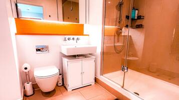 Hair dryer, towels, soap, shampoo