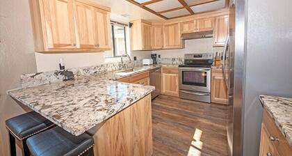 Waterfront Home with Mountain Inspired Decor, Private Hot Tub and Boat Dock 2085S~