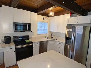 Stovetop, dishwasher - Centrally Located Cabin with Upgraded Kitchen and Bathrooms! (South Lake Tahoe)