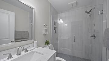 Hair dryer, towels, soap, shampoo