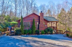A log cabin with a chimney, a porch, and a covered outdoor seating area. - Misty Creek Cabin Private 3 BDR w/ Game Room! (Blue Ridge)