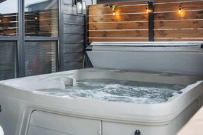 Cabin, Multiple Beds, Balcony, Pool View (Rocky Shores Retreat) | Indoor spa tub