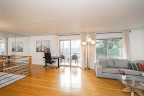 Huis, meerdere bedden, patio | Woonruimte | Een televisie