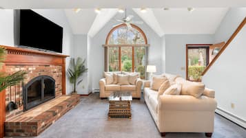 House, Multiple Beds, Hot Tub, Garden View | Living area | 50-inch flat-screen TV with cable channels, TV, fireplace