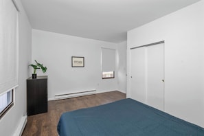 Appartement, 1 queensize bed, patio, uitzicht op tuin | 1 slaapkamer, individueel gedecoreerd, individueel gemeubileerd