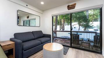 Studio, 1 King Bed with Sofa bed, Patio, Mountain View (Elmer's Hideout) | Living area | 60-inch flat-screen TV with digital channels, fireplace