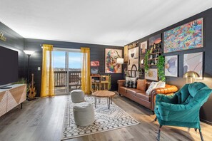 Condo, Multiple Beds, Balcony, Mountain View (Marilyn’s Modern Hideaway) | Living area | 42-inch flat-screen TV with digital channels