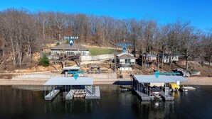 A lakeside property with docks, a guest dock, and cabins labeled 'Big Bear' and 'Little Bear'. - Big Bear Bungalow Stay on Ozark Waterfront (Gravois Mills)