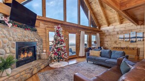 Cabin, Multiple Beds, Pool Access, Mountain View (Little Cub Retreat) | Living area | 50-inch flat-screen TV with digital channels, fireplace - Little Cub Retreat - Private Hot Tub & Indoor Pool (Gatlinburg)