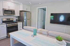 Fridge, microwave, oven, stovetop - Hidden Beach Bungalow - Walking distance to the beach, shops and great eats! (New Smyrna Beach)