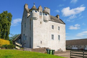 A large, historic building with multiple towers and a prominent central tower. - Unique Castle Stay in Perth - Corporate & Couples (Perth)