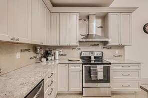 Fridge, microwave, oven, stovetop - Luxury Loft I Skyline Views in RiNO (Denver)
