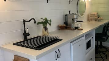 Fridge, microwave, coffee/tea maker, toaster