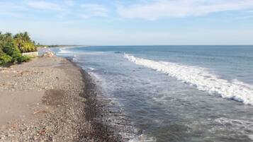On the beach, sun loungers