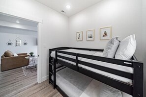 4 bedrooms, desk, iron/ironing board, travel cot