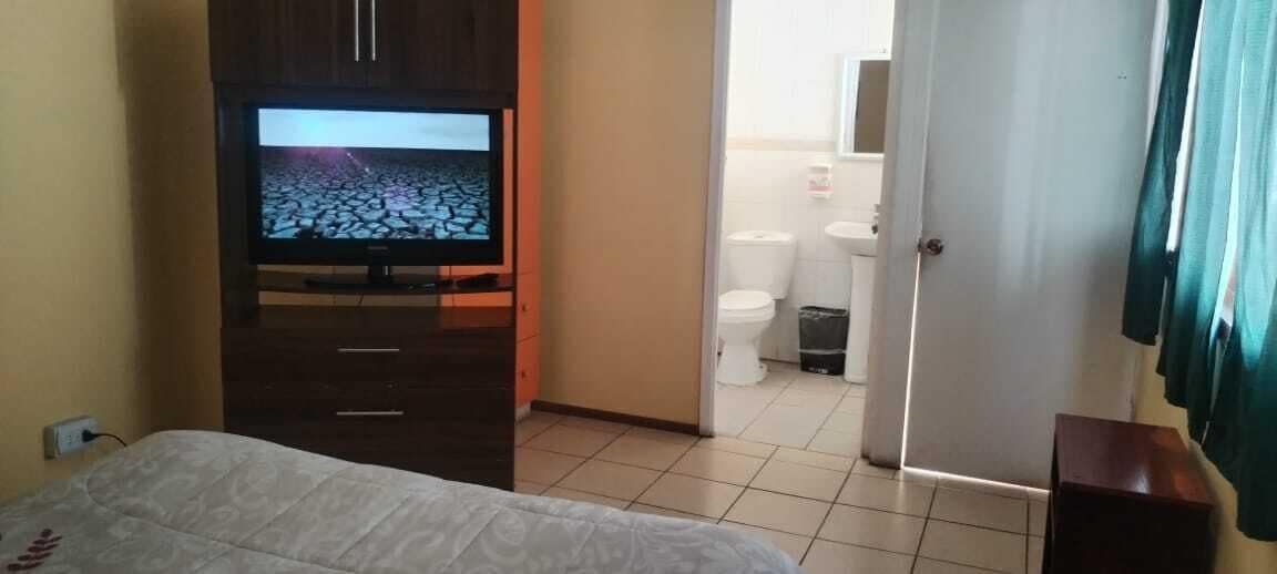 Basic Single Room, 1 Double Bed | Bathroom | Shower, towels, soap, toilet paper