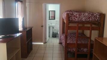 Standard Quadruple Room | Bathroom | Shower, towels, soap, toilet paper