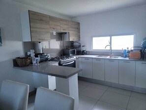 Fridge, microwave, oven, stovetop - Poolside Paradise: 2BR Downtown! (Punta Cana)