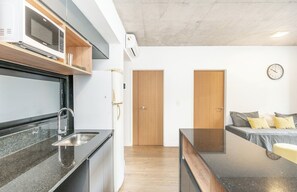 Family Apartment | Private kitchen | Full-size fridge, microwave, oven, stovetop - CloudBA Paraguay (Buenos Aires)