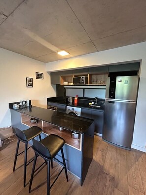 Deluxe Triple Room | Private kitchen
