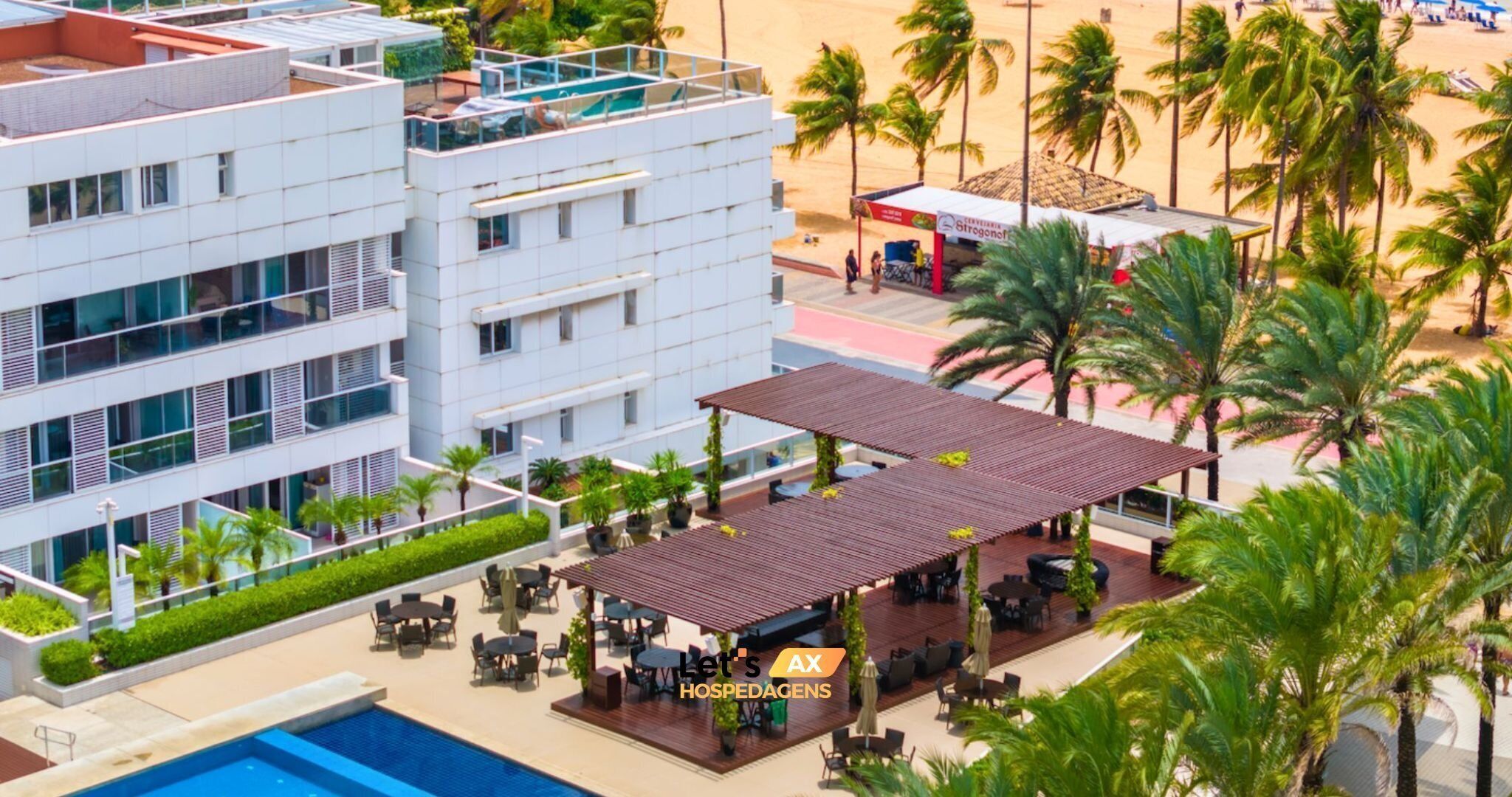 Outdoor pool, a heated pool, free cabanas, pool umbrellas