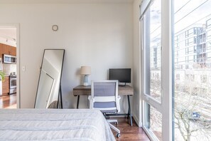 1 bedroom, desk, iron/ironing board, travel cot