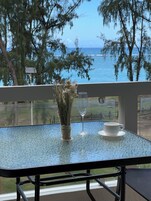 Comfort Apartment, Ocean View | Living area | 32-inch Smart TV with satellite channels