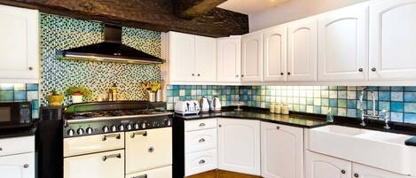 Fridge, microwave, dishwasher, coffee/tea maker