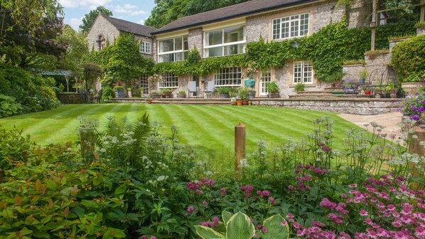 Property grounds - River Cottage, large self-catering home in the village of Ashford-in the-Water. (Ashford-in-the-Water)