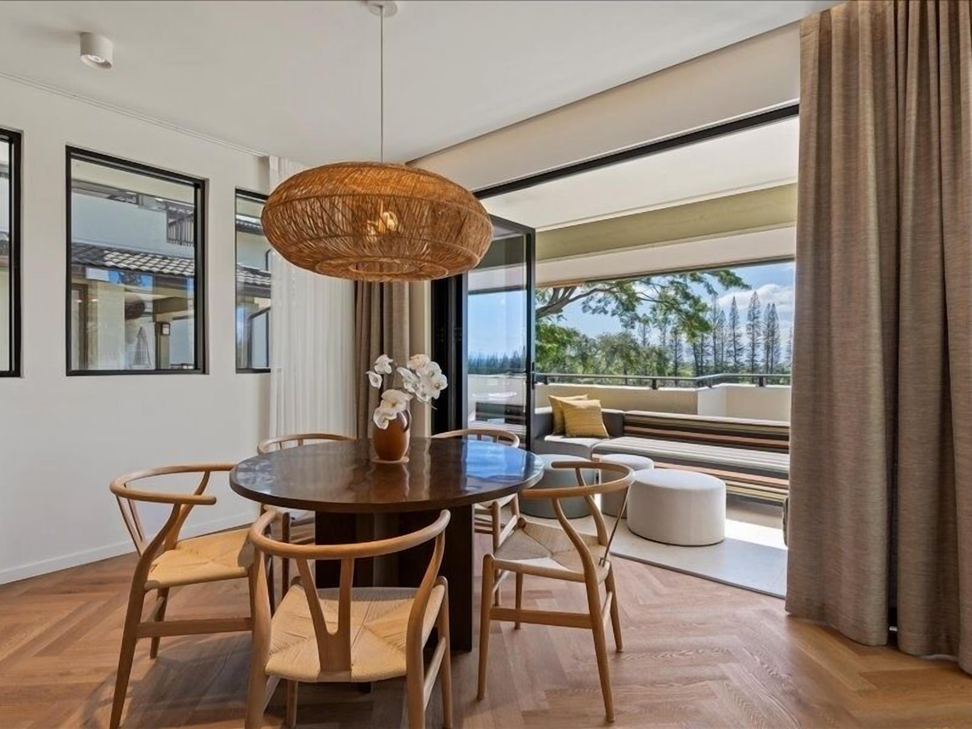 Bring outdoor indoors with fully retractable lanai doors on main floor 