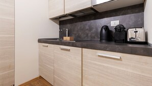 Leilighet – exclusive, 1 dobbeltseng med sovesofa, byutsikt | Eget kjøkken | Espressomaskin, kaffetrakter/tekoker, kjøleskap og mikrobølgeovn