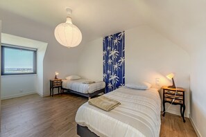 4 slaapkamers, een strijkplank/strijkijzer, gratis wifi, beddengoed