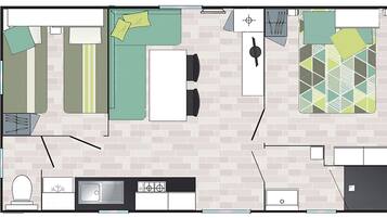 A floor plan of a hotel room with a bed, a desk, a chair, a small table, a sofa, a TV, a bathroom, and a kitchen area.