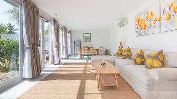 5 Bedroom Pool Villa | Living area | 42-inch flat-screen TV with cable channels