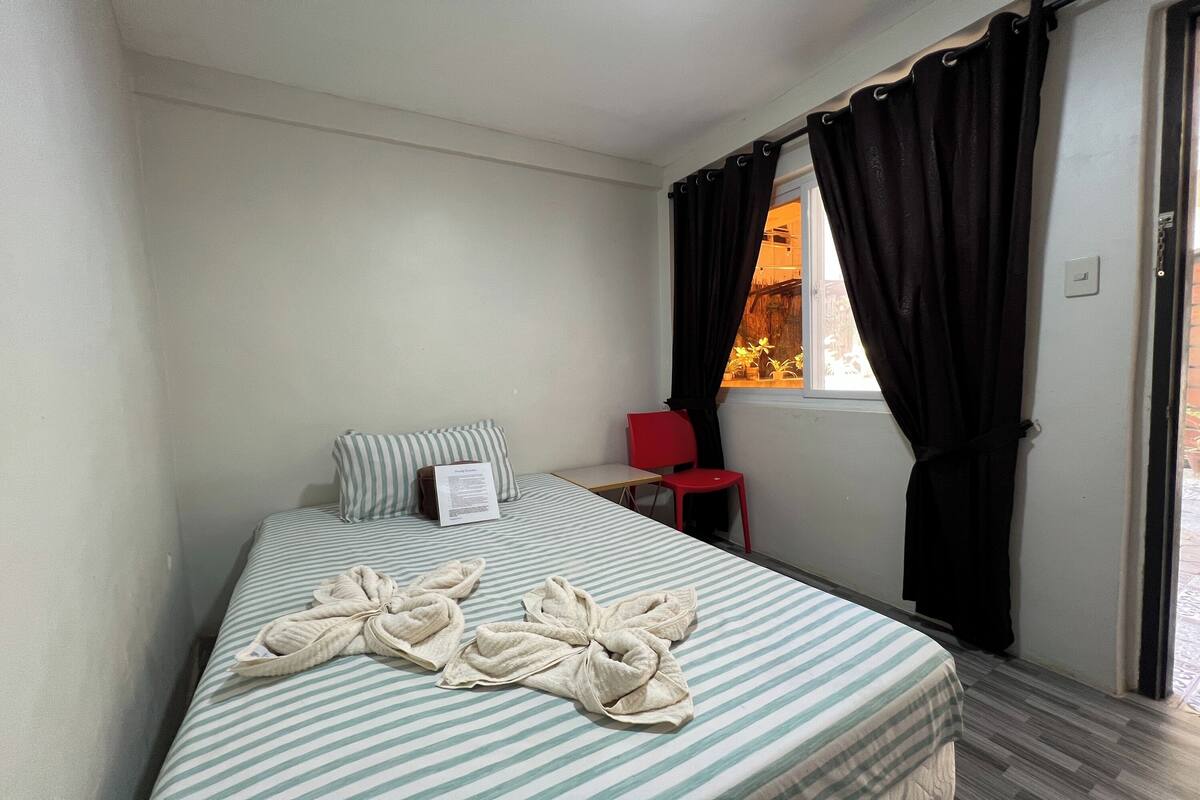 Desk, blackout curtains, free WiFi, bed sheets