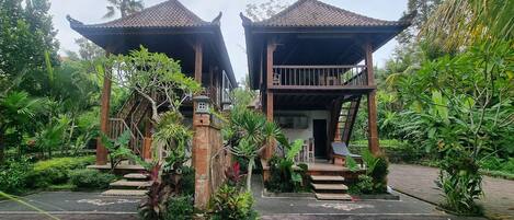 Deluxe Villa, Pool Access | Living area | 32-inch LED TV with cable channels
