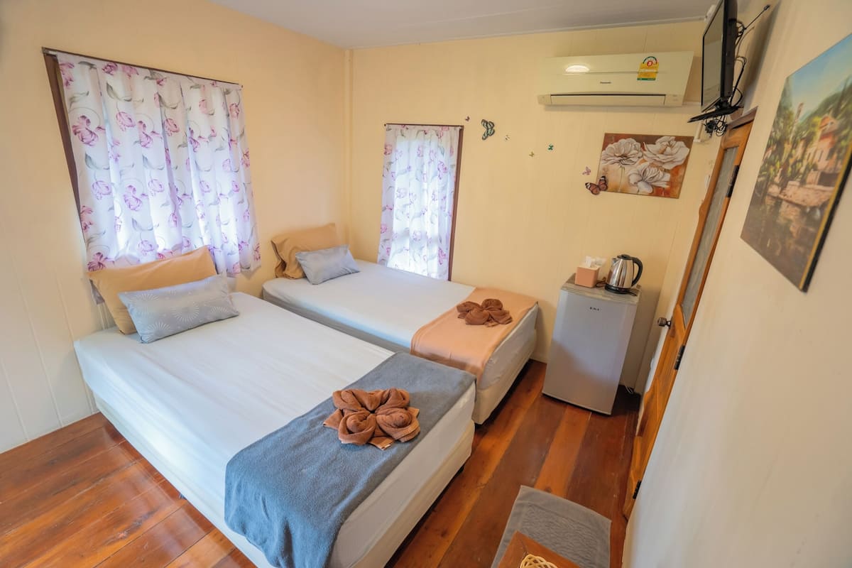 Bungalow Deluxe | 1 habitación, escritorio, wifi gratis y ropa de cama