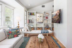 Smart TV, fireplace, table tennis, books