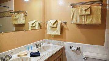 Hair dryer, towels, shampoo