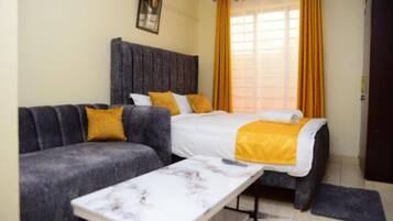 Studio | Individually decorated, individually furnished, desk, laptop workspace