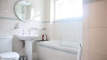 Hair dryer, towels, soap, shampoo