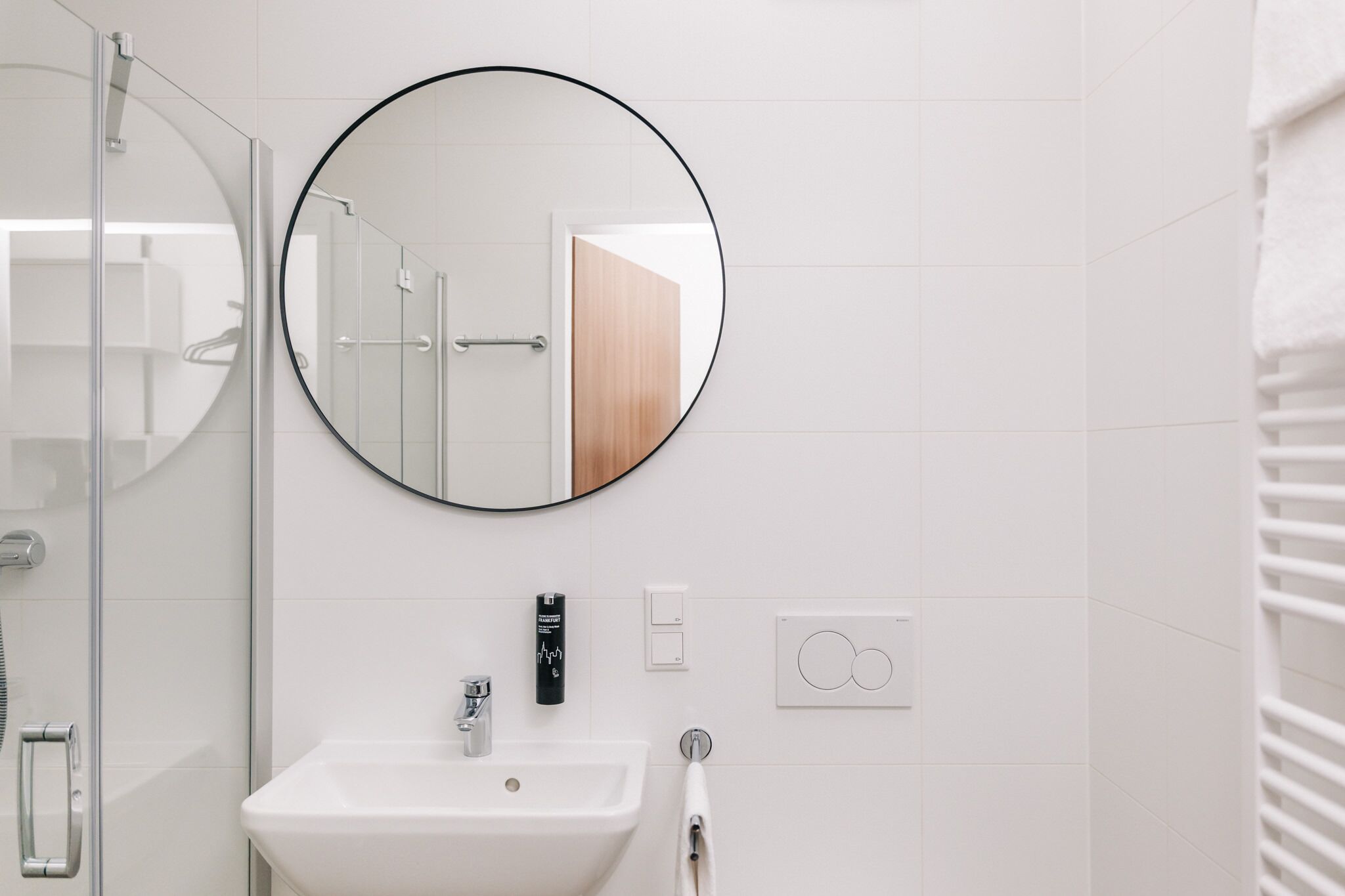 Basic Studio | Bathroom | Shower, towels, soap, shampoo