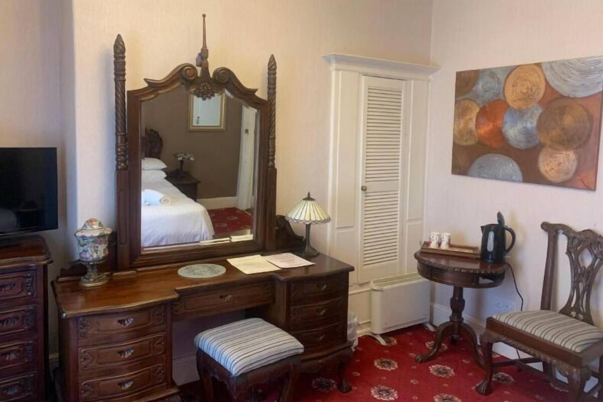 Desk, laptop workspace, free WiFi, bed sheets