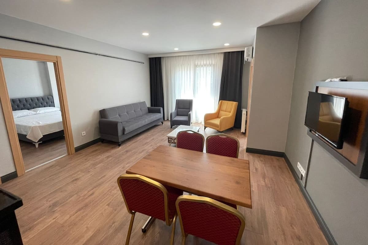 City Apartment | Living area | Flat-screen TV